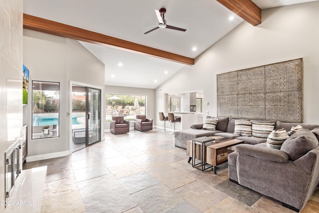 10658 E Cinnabar Ave, Scottsdale, AZ 85258 - living area featuring stone tile flooring, high vaulted ceiling, recessed lighting, ceiling fan, and beamed ceiling