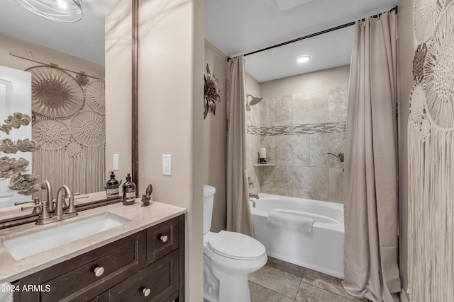 full bathroom with toilet, vanity, and shower / tub combo with curtain