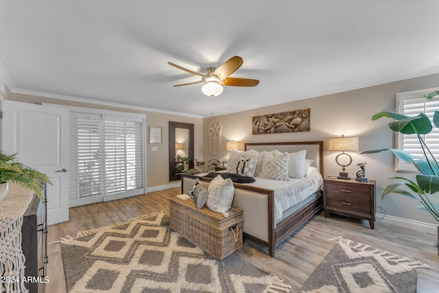 bedroom featuring ceiling fan, ornamental molding, and light hardwood / wood-style floors