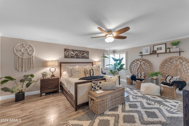 bedroom featuring ceiling fan and light wood-type flooring