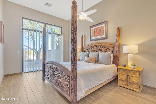 bedroom with ceiling fan, access to exterior, and light hardwood / wood-style flooring