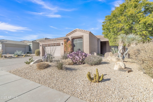 single story home featuring a garage