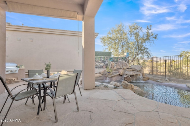 view of patio with area for grilling