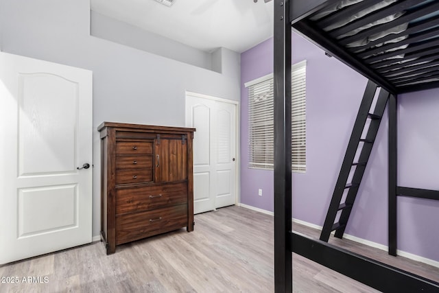 1333 W Deer Creek Rd, Phoenix, AZ 85045 - bedroom with light wood-style floors and baseboards