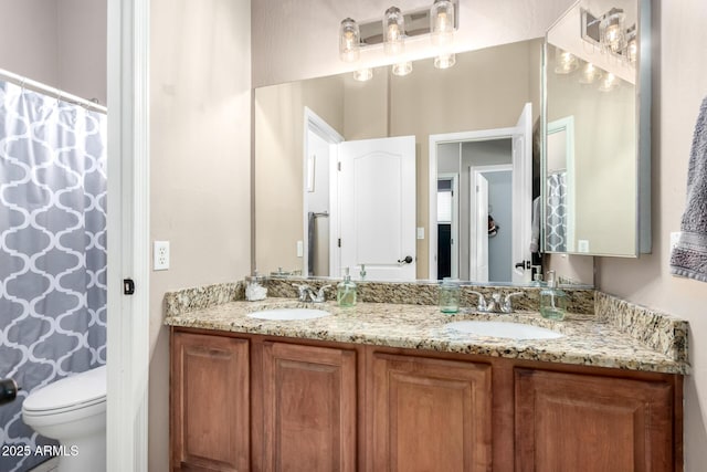 1333 W Deer Creek Rd, Phoenix, AZ 85045 - full bathroom with a sink, a shower with curtain, toilet, and double vanity