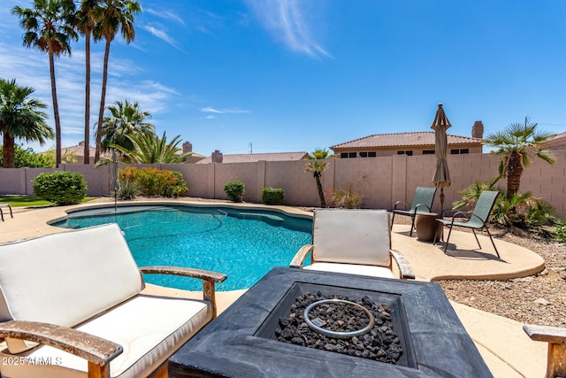 1333 W Deer Creek Rd, Phoenix, AZ 85045 - view of swimming pool featuring a patio, a fenced in pool, a fire pit, and a fenced backyard