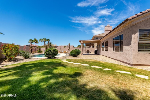 1333 W Deer Creek Rd, Phoenix, AZ 85045 - view of yard featuring a fenced backyard, a ceiling fan, a fenced in pool, and a patio area