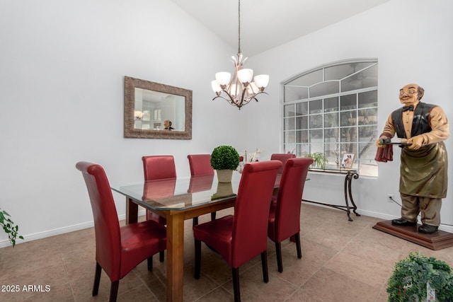 dining room with lofted ceiling, light tile patterned floors, a chandelier, and baseboards