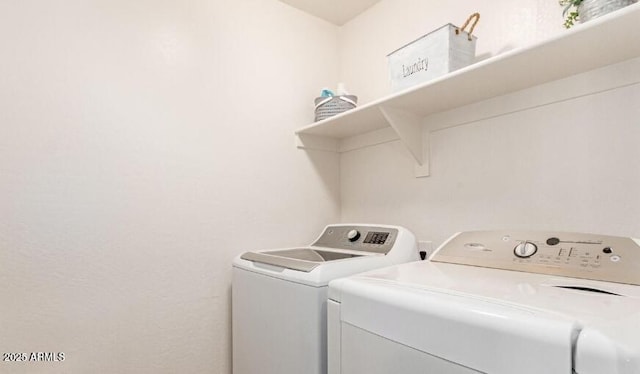 washroom with laundry area and independent washer and dryer