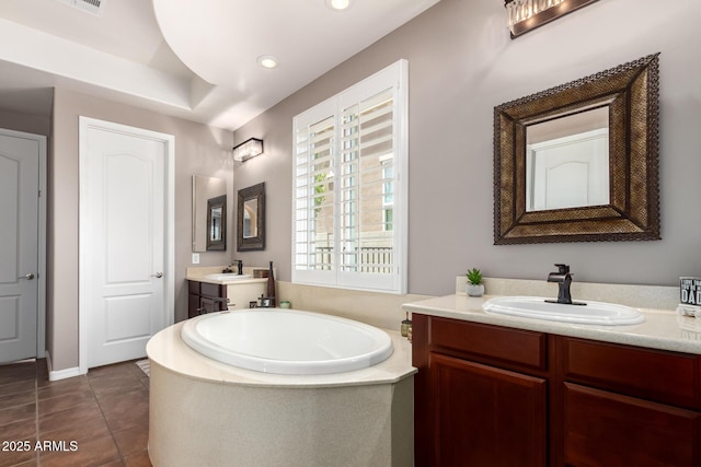 3441 S Halsted Pl, Chandler, AZ 85286 - full bathroom with a garden tub, tile patterned flooring, two vanities, and recessed lighting