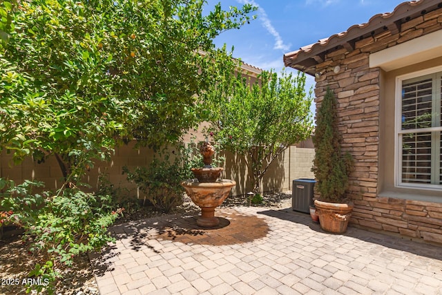 3441 S Halsted Pl, Chandler, AZ 85286 - fenced backyard featuring a patio area and cooling unit