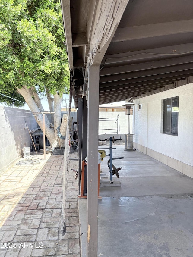 view of patio with fence