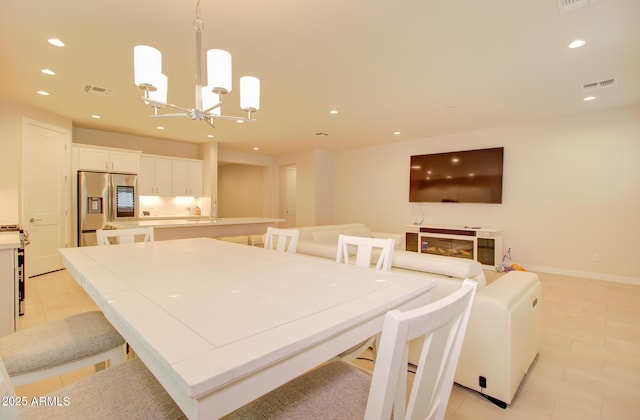 dining room with a chandelier