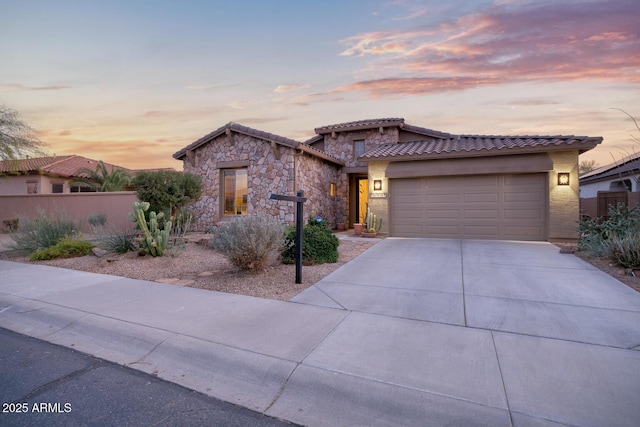 view of front of property featuring a garage