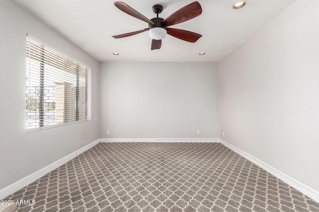 spare room featuring a ceiling fan, recessed lighting, and baseboards