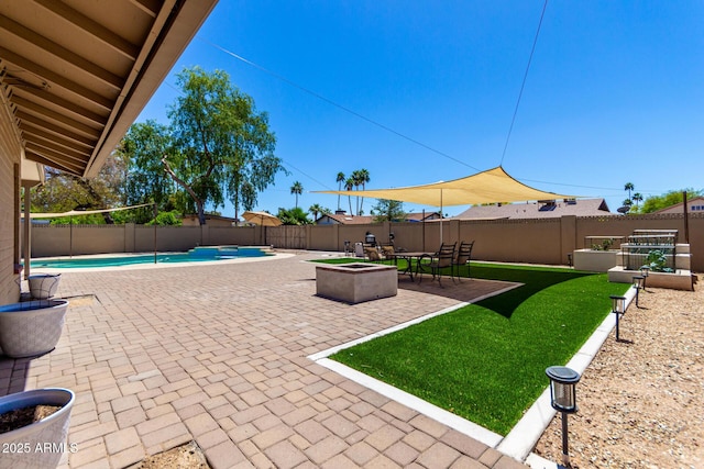 view of patio / terrace featuring a fenced in pool and a fenced backyard