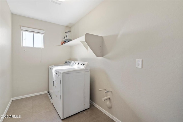 laundry area with washing machine and dryer