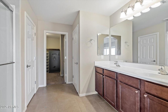 bathroom featuring tile patterned floors and vanity