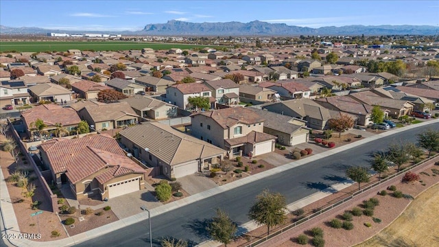 birds eye view of property featuring a mountain view