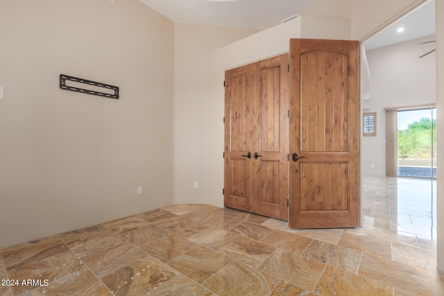 3730 E Cloud Rd, Cave Creek, AZ 85331 - unfurnished bedroom featuring a towering ceiling and access to outside