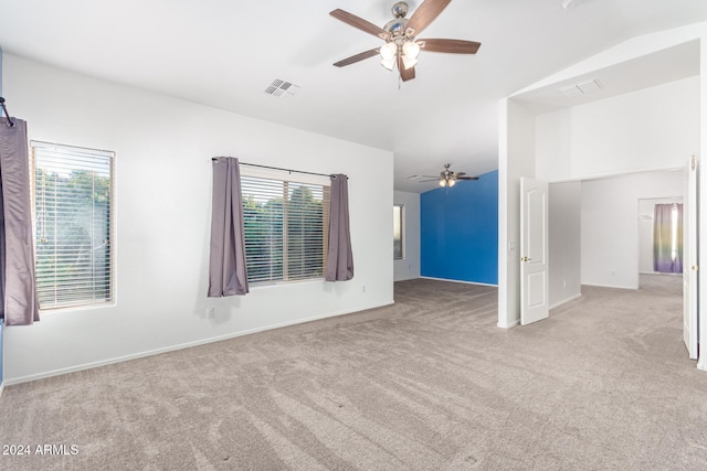 empty room with light colored carpet and ceiling fan