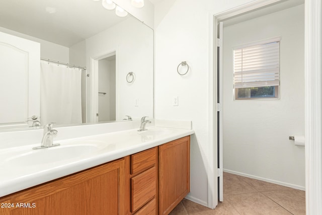 bathroom with vanity and tile patterned floors