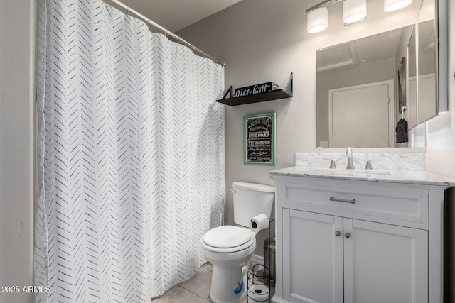 bathroom with toilet, tile patterned flooring, vanity, and a shower with curtain