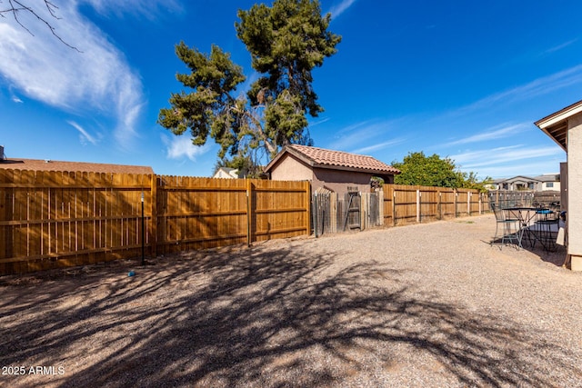 view of yard featuring a fenced backyard