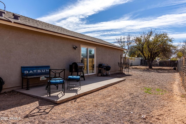 exterior space with a fenced backyard and area for grilling