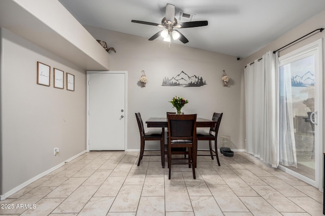 dining space featuring a ceiling fan, visible vents, and baseboards