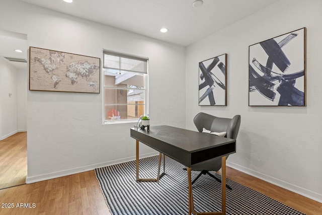 office space featuring visible vents, recessed lighting, wood finished floors, and baseboards