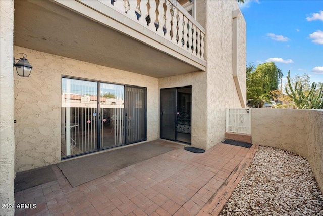 view of patio / terrace with a balcony