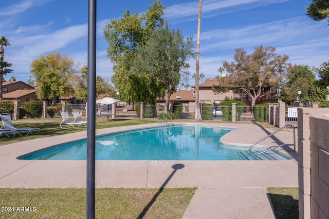 view of pool featuring a patio area