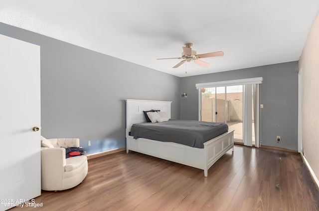 4024 W Griswold Rd, Phoenix, AZ 85051 - bedroom with access to exterior, wood finished floors, baseboards, and ceiling fan