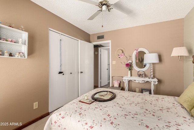 4024 W Griswold Rd, Phoenix, AZ 85051 - bedroom with a closet, baseboards, a ceiling fan, a textured ceiling, and carpet flooring