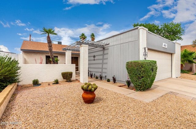 4024 W Griswold Rd, Phoenix, AZ 85051 - mid-century modern home featuring a pergola and stucco siding