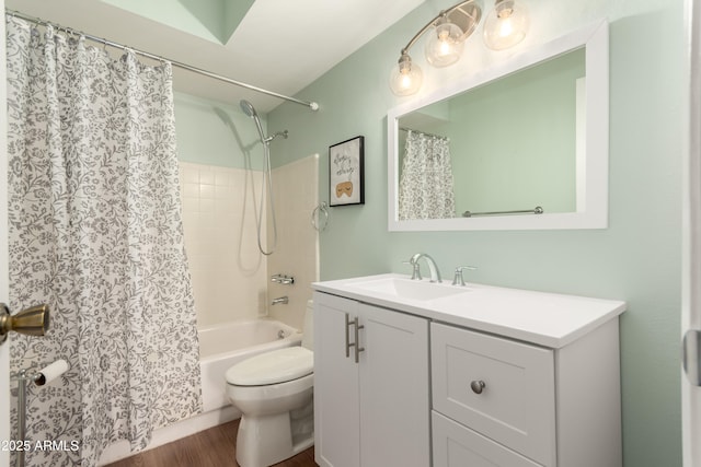 4024 W Griswold Rd, Phoenix, AZ 85051 - full bath with toilet, vanity, wood finished floors, and shower / tub combo with curtain