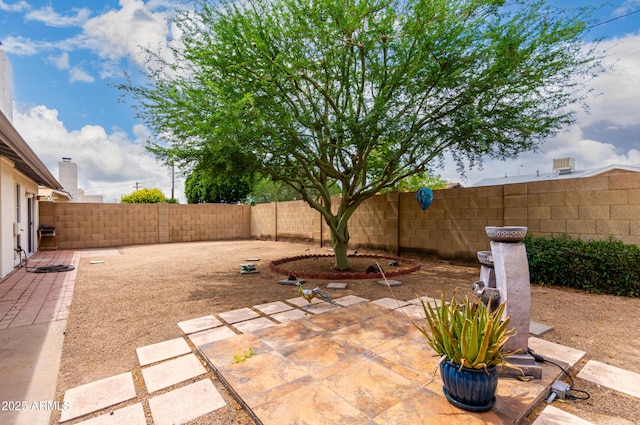4024 W Griswold Rd, Phoenix, AZ 85051 - fenced backyard featuring a patio area