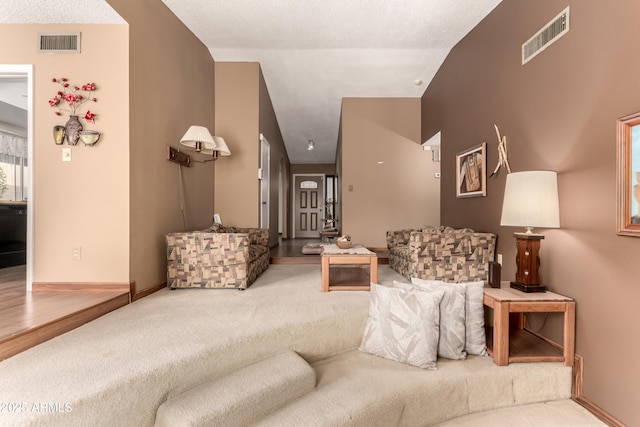 4024 W Griswold Rd, Phoenix, AZ 85051 - living area featuring carpet flooring, vaulted ceiling, and baseboards