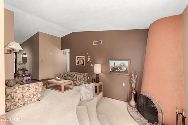 4024 W Griswold Rd, Phoenix, AZ 85051 - living room featuring vaulted ceiling, carpet floors, and baseboards