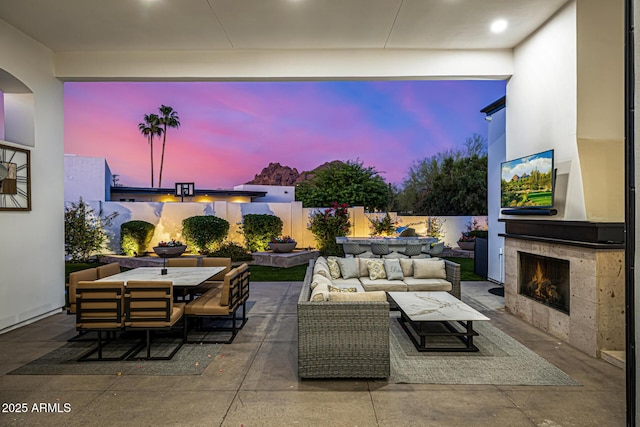5404 N 41st St, Phoenix, AZ 85018 - fenced backyard with a patio, an outdoor living space with a fireplace, and outdoor dining area