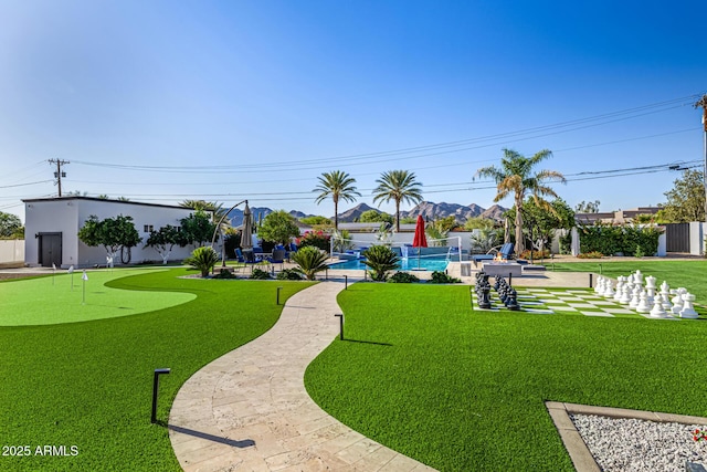 5404 N 41st St, Phoenix, AZ 85018 - view of home's community featuring an area to practice putting and a swimming pool