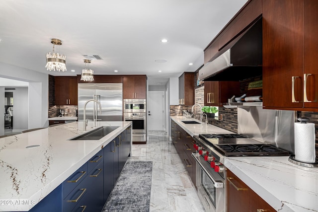 5404 N 41st St, Phoenix, AZ 85018 - kitchen featuring a sink, high end appliances, a warming drawer, light marble finish flooring, and recessed lighting