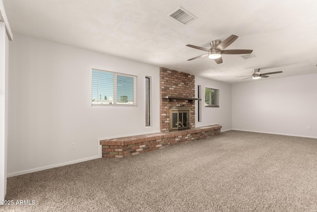1028 W 5th St, Mesa, AZ 85201 - unfurnished living room with a ceiling fan, a fireplace, baseboards, and carpet floors
