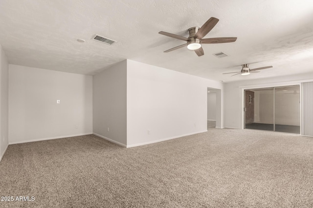 1028 W 5th St, Mesa, AZ 85201 - carpeted empty room with a ceiling fan, baseboards, and a textured ceiling