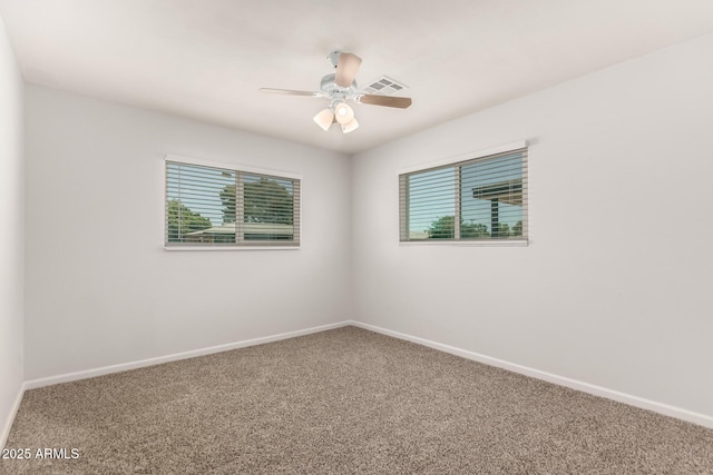 1028 W 5th St, Mesa, AZ 85201 - carpeted spare room with baseboards and ceiling fan