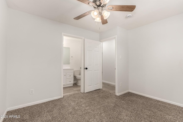 1028 W 5th St, Mesa, AZ 85201 - unfurnished bedroom featuring carpet, baseboards, connected bathroom, and a ceiling fan