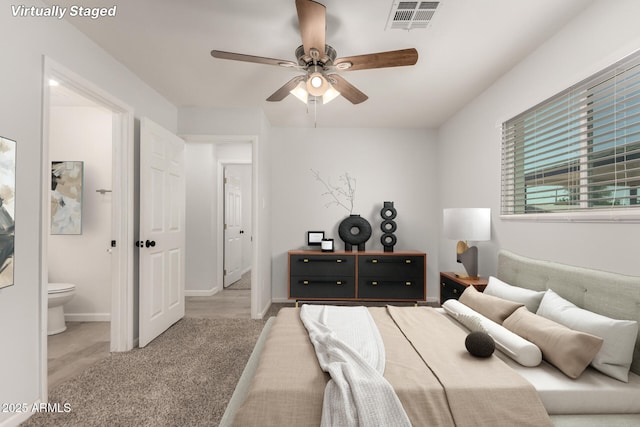1028 W 5th St, Mesa, AZ 85201 - bedroom featuring wood finished floors, ensuite bath, baseboards, and ceiling fan