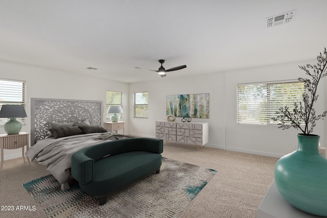 carpeted bedroom featuring ceiling fan