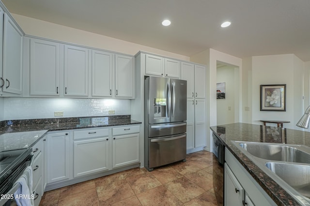 kitchen with tasteful backsplash, recessed lighting, electric range, a sink, and stainless steel refrigerator with ice dispenser